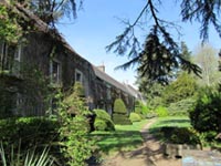 The living quarters covered in greenery